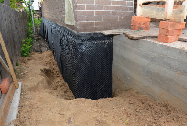SJ Waterproofing Pros technician performing targeted Emergency Waterproofing assessment in Albany, WI